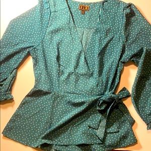 cute green blouse with side knot.
